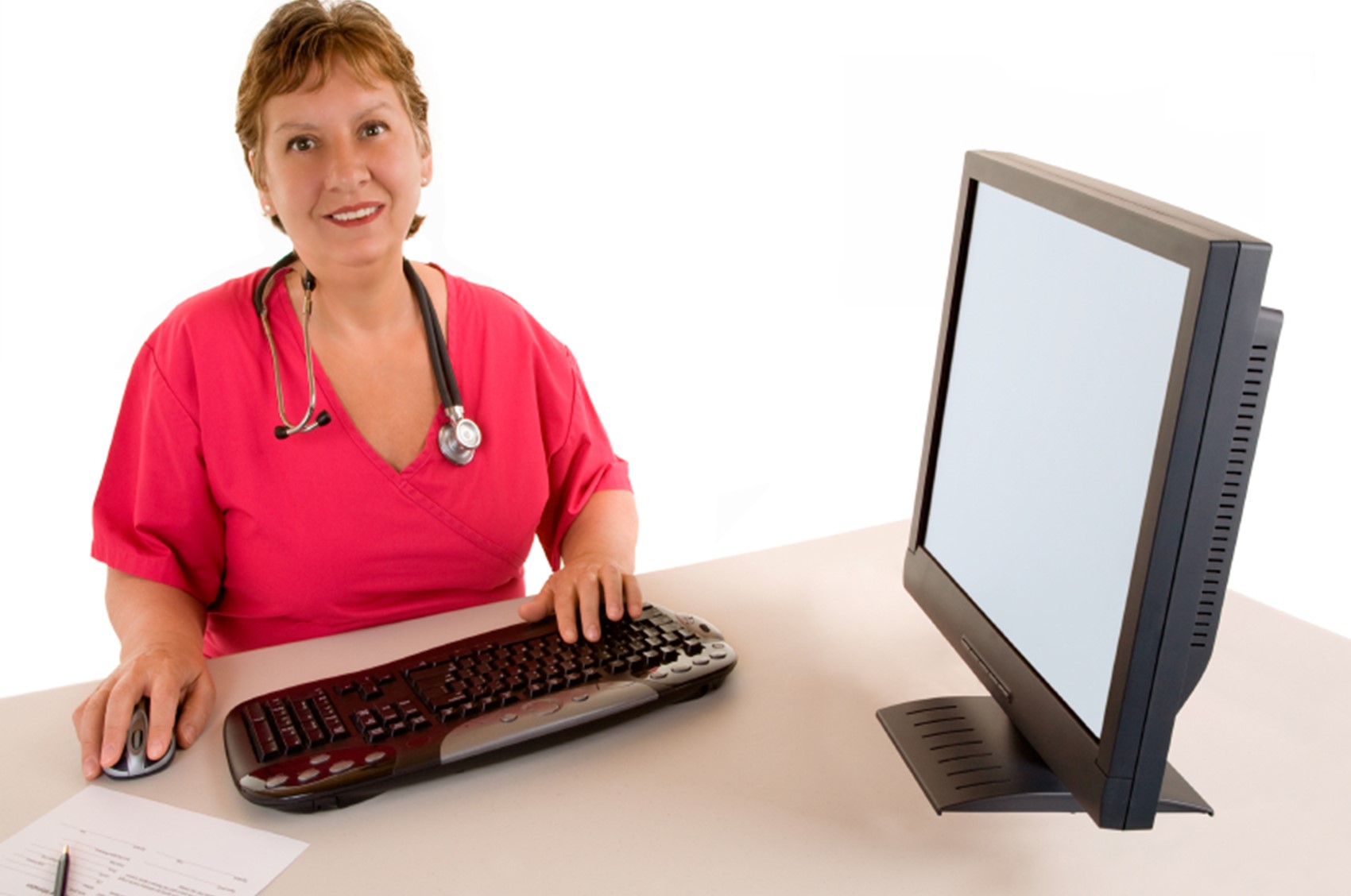 Nurse looking at camera over keyboard.jpg